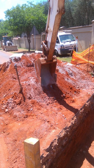 Storm water connection with road crossing